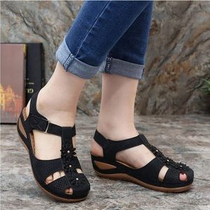 Womens black wedges sandle with flower detail